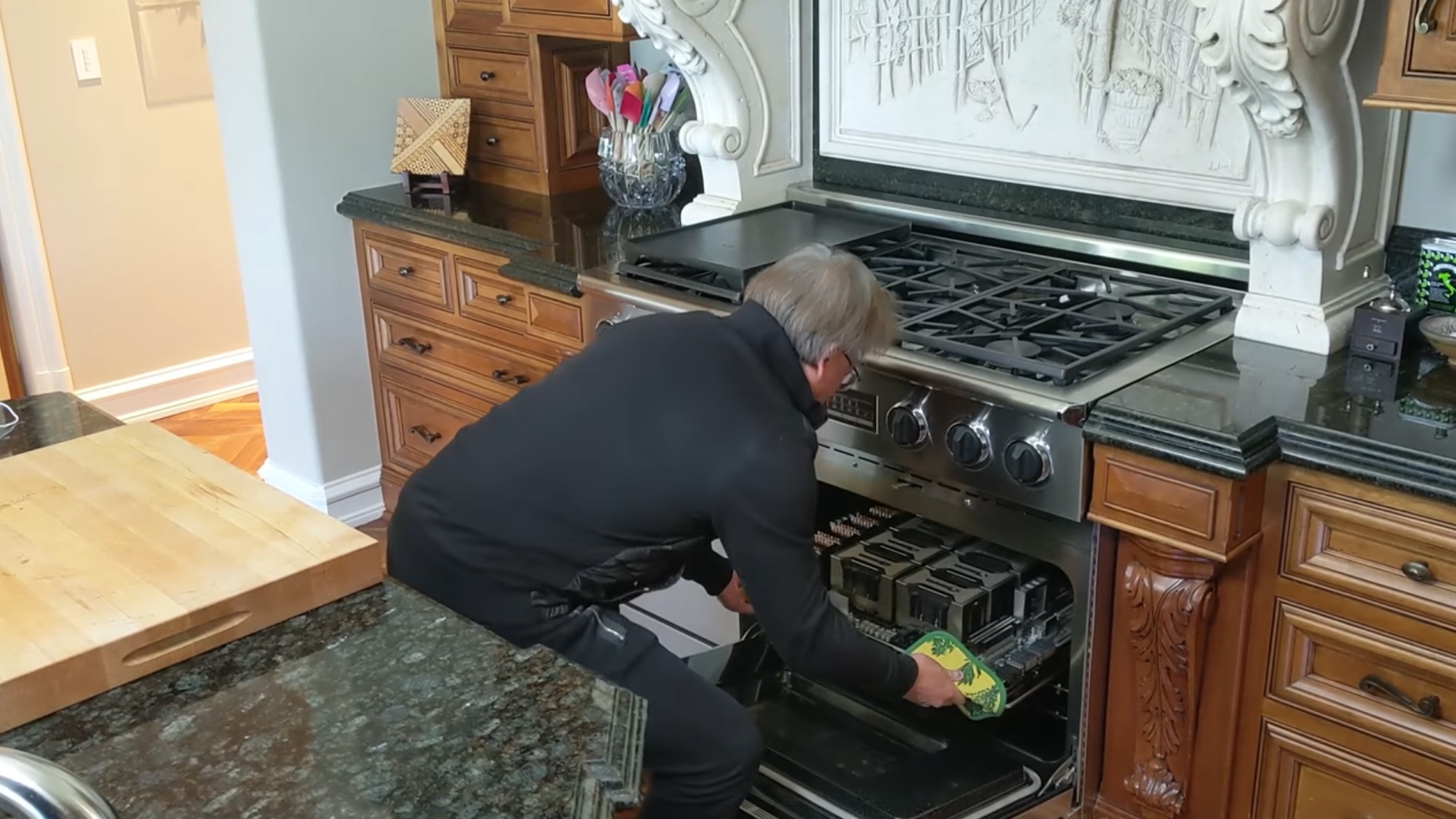 jensen pulls a gpu out of the oven